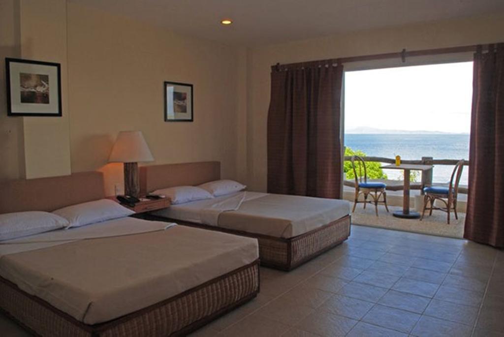 Almont Beach Resort Surigao Habitación foto