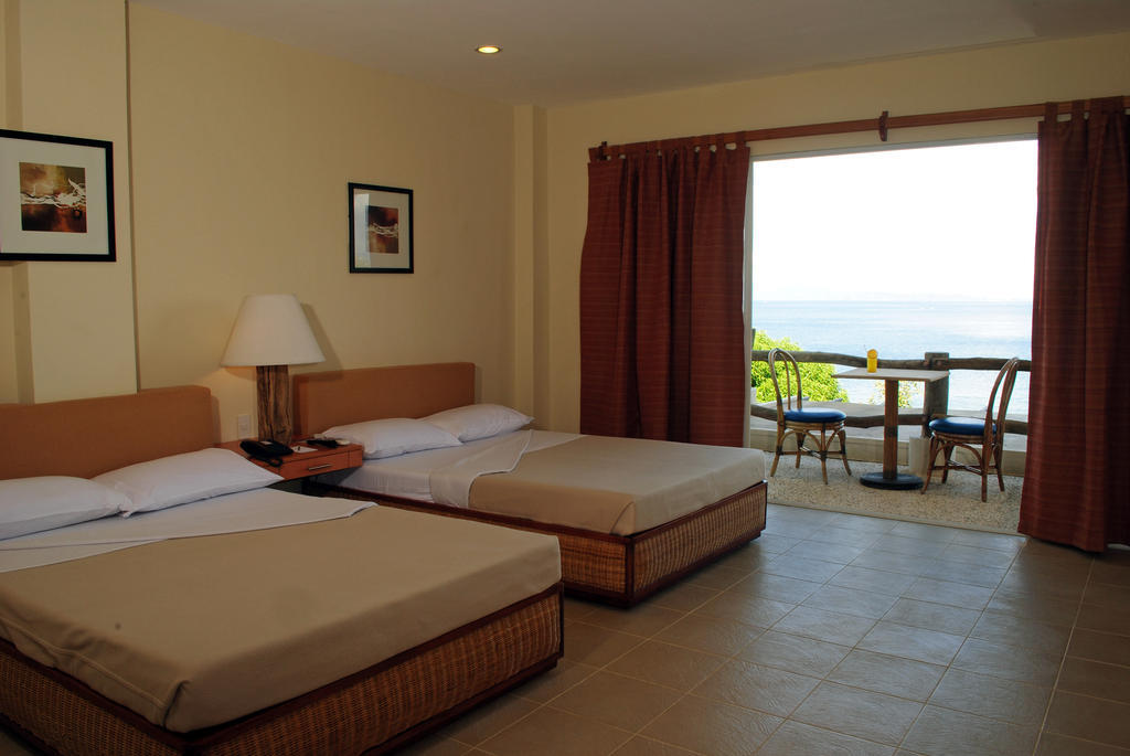 Almont Beach Resort Surigao Habitación foto